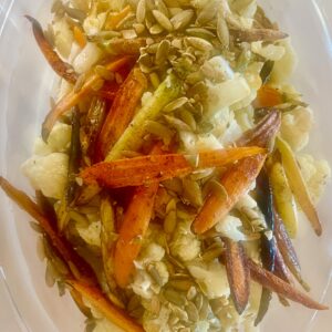 Hazelnut Oil Roasted Carrots and Cauliflower- drizzled with my special seasoning, white balsamic syrup and toasted pepitas